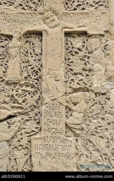 Historic Armenian cross-stone, khachkar, near the main cathedral, UNESCO World Heritage Site, Echmiadzin, Armenia, Asia.