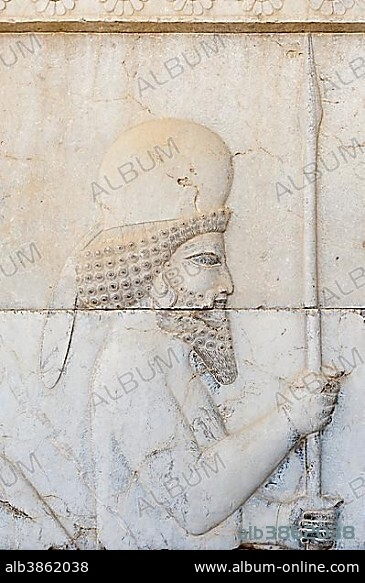 Ancient relief of the Achaemenids, Meder with lance, soldier of Immortal Guard, outer wall of the Apadana Palace, archaeological site, ancient Persian city Persepolis, UNESCO World Heritage Site, Fars Province, Iran, Asia.