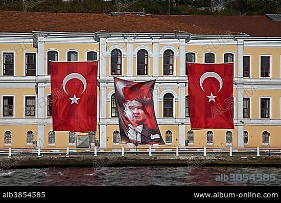Flags of Musatafa Kemal Atatürk and Turkey flying on a building in honour of the anniversary of his death on 10 November 1938, Istanbul, Turkey, Asia.