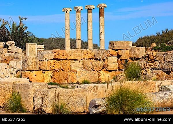Four ancient columns with ionic capital, Ruins of the Roman City Leptis Magna, Libya, Africa.