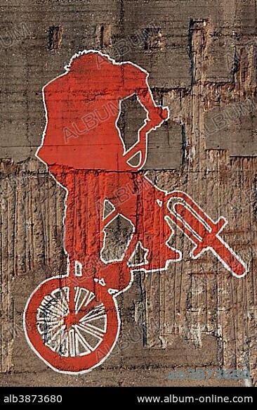 BMX biker jumping, graffiti, street art, Duisburg, North Rhine-Westphalia, Germany, Europe.