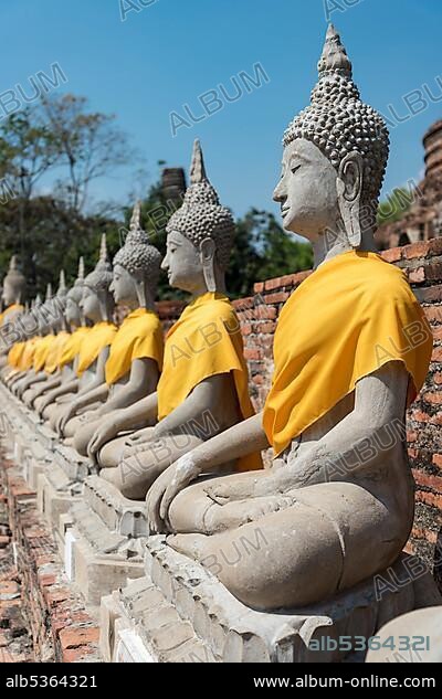 Row of Buddha statues, Wat Yai Chai Mongkhon temple, Ayutthaya, Thailand, Asia.