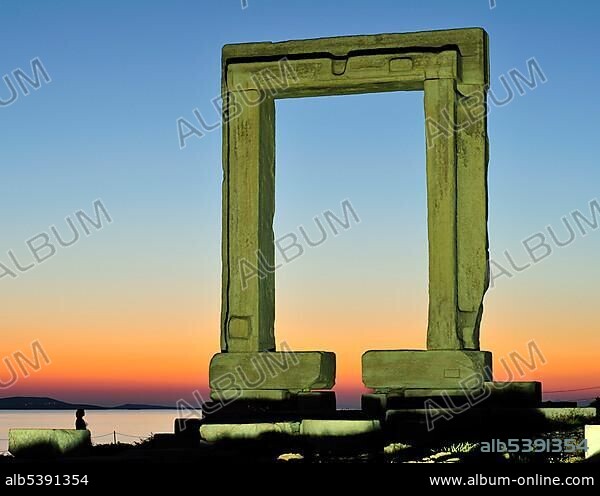 Gateway to antiquity, giant door or Portara of the Temple of Apollo at the town of Naxos, Cyclades Island Group, Greece, Europe.