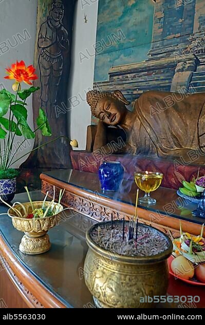 Reclining Buddha statue on an altar in a prayer room of the Brahma Vihara Buddhist monastery, Banjar, North Bali, Bali, Indonesia, Asia.