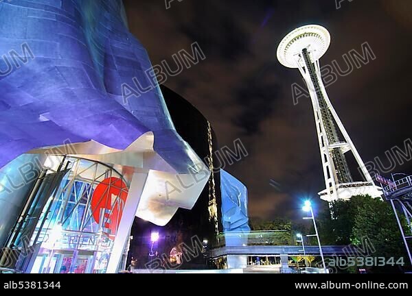 Space Needle next to the building of the Experience Music Project, EMP, and the Science Fiction Museum, SFM, Seattle center, night shot, Seattle, U.S state of Washington, USA, North America.