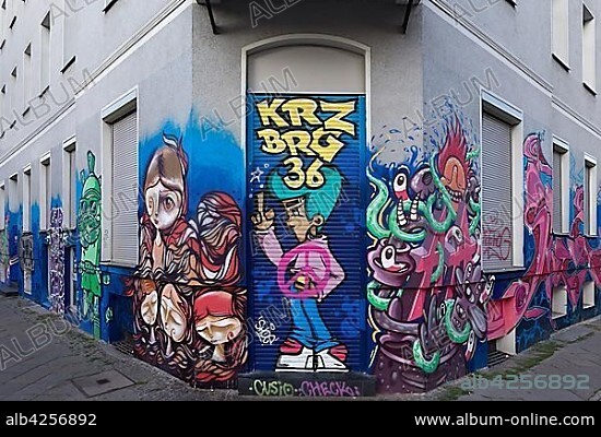 Graffiti at a corner house, Kreuzberg, Berlin, Germany, Europe.