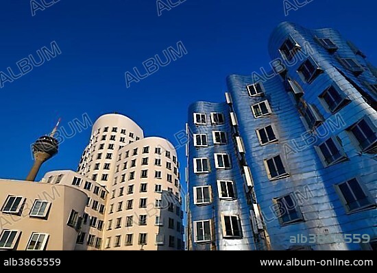 Rhine Tower with Gehry buildings, Neuer Zollhof, Media Harbour, Düsseldorf, North Rhine-Westphalia, Germany, Europe.