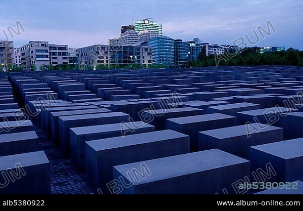 Holocaust Memorial designed by architect Peter Eisenman, memorial to the murdered jews of Europe, with a view of the skyline of the Potsdamer Platz square, Tiergarten district, Mitte district, Berlin, Germany, Europe.