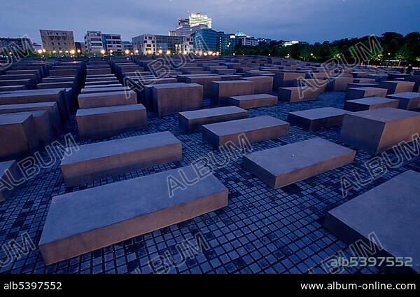 Holocaust Memorial designed by architect Peter Eisenman, memorial to the murdered jews of Europe, with a view of the skyline of the Potsdamer Platz square, Tiergarten district, Mitte district, Berlin, Germany, Europe.