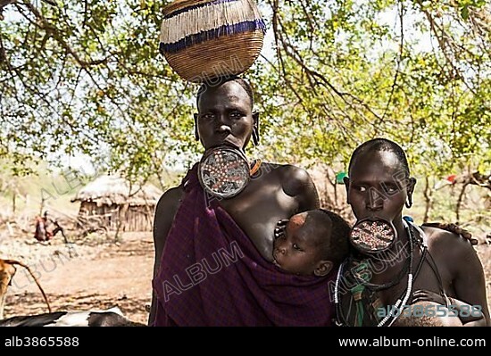 Women with lip plates, tribe of the Mursi, Southern Nations Nationalities and Peoples' Region, Ethiopia, Africa.