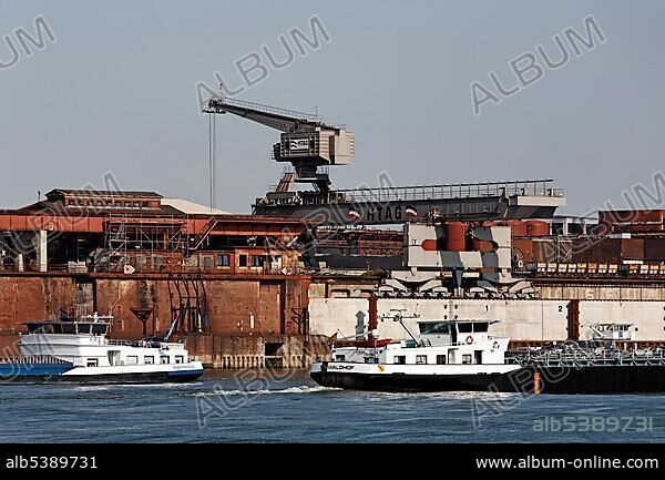 Duisburg copper smelter, now DK Recycling, with cargo ships on the Rhine River, Duisburg-Ruhrort, Ruhr area, North Rhine-Westphalia, Germany, Europe.