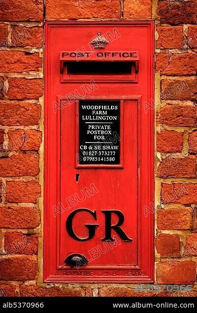 Old English letter box, "GR" for King George, in a wall, Woodfiels Farm, Lullington, South Derbyshire, England, United Kingdom, Europe.