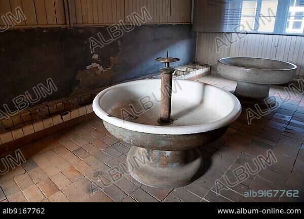 Latrines, toilets and washroom in a prisoners' barrack, Memorial, Concentration camp Sachsenhausen, Oranienburg near Berlin, Germany, Europe.
