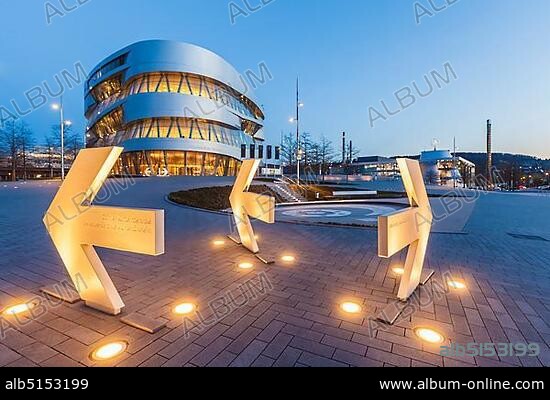 Signpost Daimler Group Headquarters, behind it Mercedes-Benz Museum, Stuttgart, Baden-Württemberg, Germany, Europe.