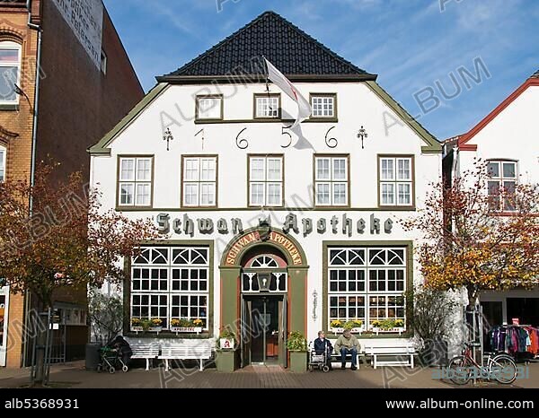 Schwan Apotheke, Schwan Pharmacy in an old building built in 1656, historic centre of Husum, North Frisia, Schleswig-Holstein, Germany, Europe.