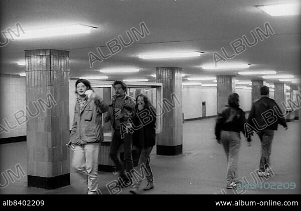 Germany, Berlin, 03. 10. 1990, victims of tear gas flee to Alexanderplatz underground station, demonstration for reunification on 3 October 1990, rioting at Alexanderplatz, Europe.