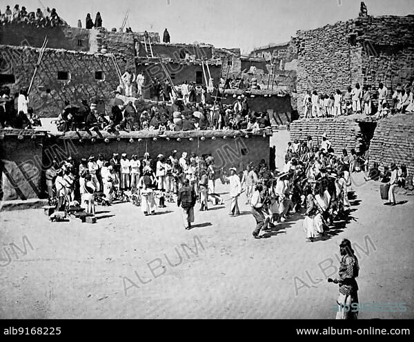 In a pueblo, village of the Zuni Indians in the state of Arizona, spectators at an Indian dance, ca 1880, America, Historic, digitally restored reproduction of a 19th century photographic original.
