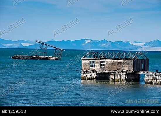 Wooden houses, ruins of the old russian coalmine in the atlantic ocean, Colesbukta, Svalbard, Arctic, Norway, Europe.