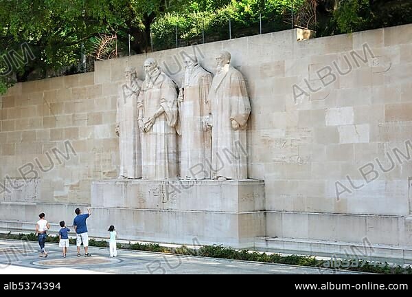 Reformation monument Wall of Reformers f.l.t.r. Guillaume Farel, Jean Calvin, Theodore Beza, John Knox Geneva Switzerland.