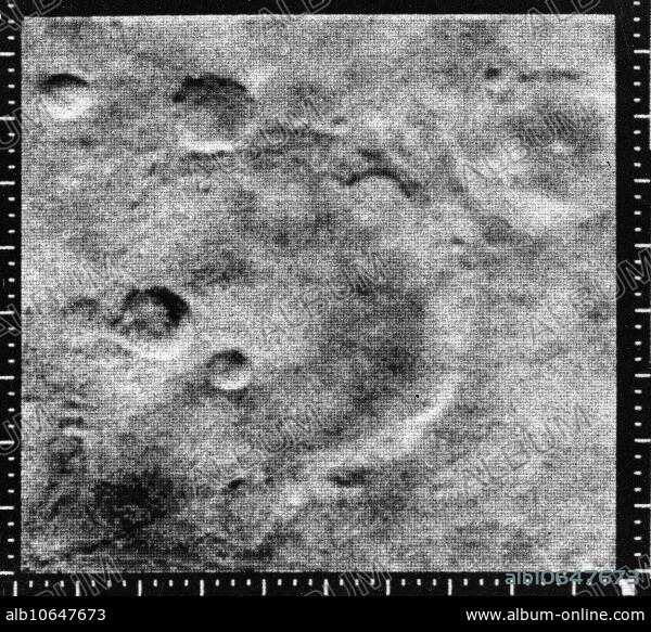 Mariner 4 image of the crater named after it, the 151 km diameter Mariner crater at 35 S, 164 W. Running from the lower left corner of the frame through the bottom of the crater is a linear ridge which is part of Sirenum Fossae. The image was taken from 12,600 km and covers 250 km by 254 km. North is up. (Mariner 4, frame 11E). Mariner 4 was the first spacecraft to get a close look at Mars. Flying as close as 9,846 kilometers (6,118 miles), Mariner 4 revealed Mars to have a cratered, rust-coloured surface, with signs on some parts of the planet that liquid water had once etched its way into the soil. Mariner 4 was launched on November 28, 1964 and arrived at Mars on July 14, 1965.