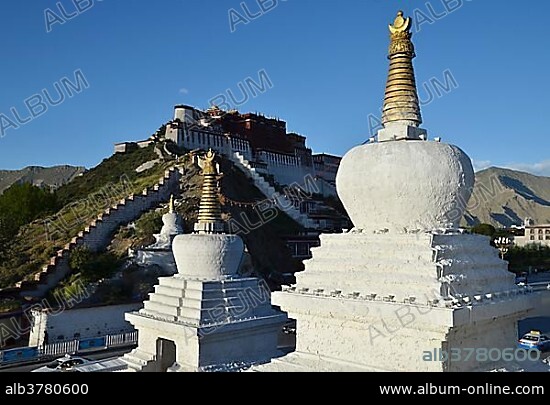 Tibetan chorten, stupa in front of Potala Palace, winter palace of the Dalai Lama in Lhasa, Tibet, China, Asia.