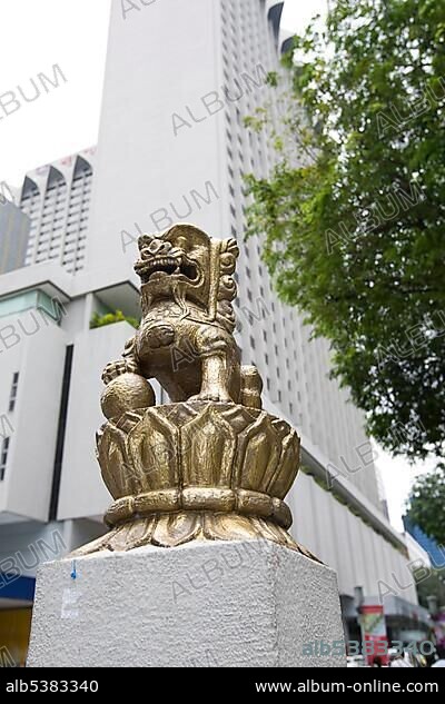 Statue of a holy lion in front of the Meritus Mandarin Hotel, Singapore, Southeast Asia, Asia.