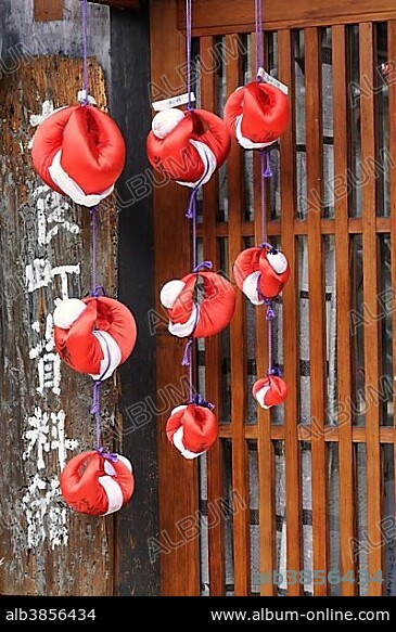 Talisman, Migawari-zaru, monkey symbol specifies the number of occupants and dispels disaster, Buddhist, Shinto, Taoist, Nara, Nara-machi, Japan, Asia.