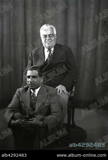 Aga Khan III (1877-1957) with his son, prince Ali Khan (1911-1960). c.1945. . Photo Taponier.