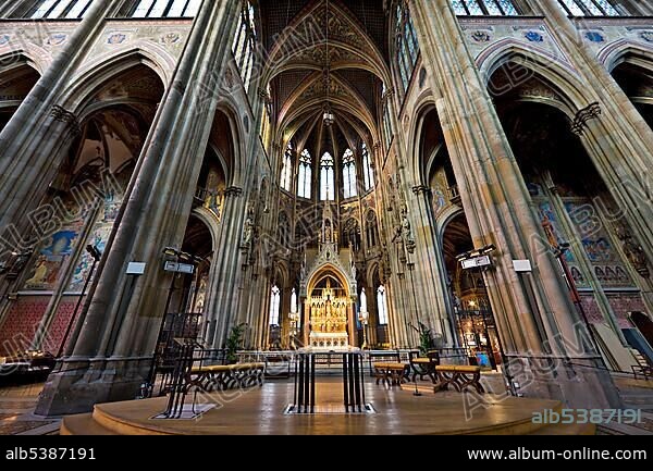 Altar at Votivkirche Church, neo-Gothic basilica in Vienna, Austria, Europe.
