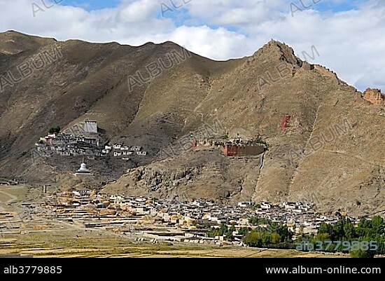 Tibetan landscape, village with a monastery, stupa and fortress on mountain slope, Yaduixiang near Tsetang, Himalayas, Tibet Autonomous Region, People's Republic of China, Asia.