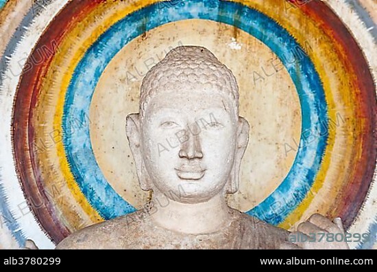 Head of a Buddha figure surrounded by a nimbus in rainbow colors, Ruwanwelisaya-Dagoba, Anuradhapura, North Central Province, Sri Lanka, Asia.