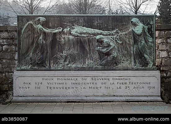 War memorial for 116 civilians shot on the wall Mur Tschoffen, bronze relief, pedestal with inscription, massacre of Dinant, First World War, Dinant, Wallonia, Belgium, Europe.