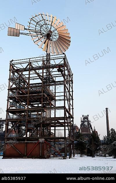 Wind energy tower and wind turbine, Duisburg-Nord Landscape Garden, disused steelworks, Ruhr area, North Rhine-Westphalia.