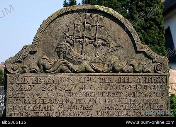 Old tombstone - gravestone at the cemetery in Nebel Island Amrum - Nebel, Island Amrum, North Friesland, Schleswig-Holstein, North Sea, Wadden Sea, Germany, Europe.