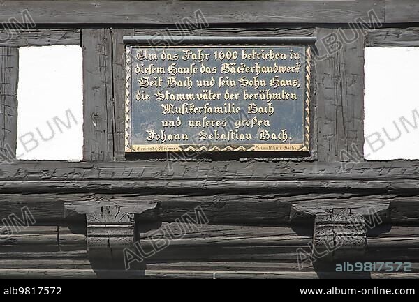 Inscription and text about Johann Sebastian Bach's family history on the historic Bach ancestral home; Bachstammhaus; origin; history; family tree; Drei Gleichen; Thuringia; Germany; Europe.