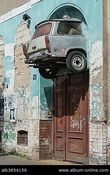 DDR-car brand Trabant, rear mounted over old doorway, Halle an der Saale, Saxony-Anhalt, Germany, Europe.