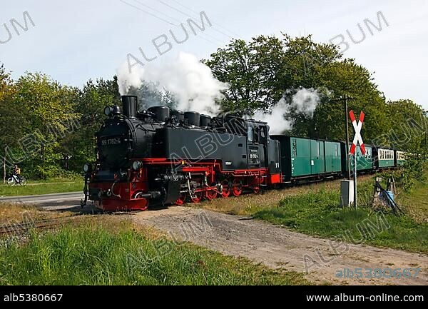 Steam locomotive "Rasender Roland", Rushing Roland, historic railway between the seaside resorts Goehren and Sellin, Ruegen island, Baltic Sea Coast, Mecklenburg-Western-Pomerania, Germany, Europe.