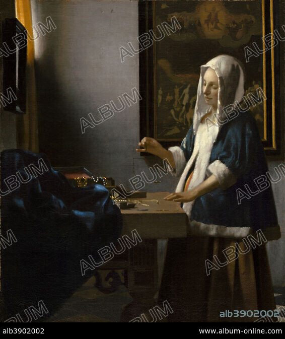 JAN VERMEER. Woman Holding a Balance. Date/Period: Ca. 1664