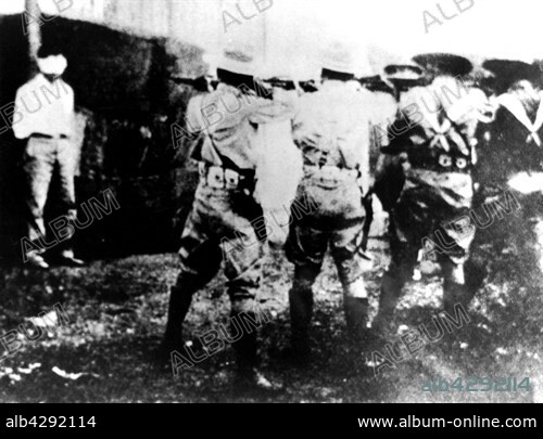 Execution of Jose Castillo Puentes, accused of the murder of Lieutenant Juan Alvarez during a battle between rebels and regular troops. 1935. Cuba. National archives, Washington.