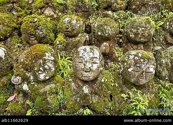 Moss-covered stone statues of rakans, the disciples of Buddha, Otagi Nenbutsu-ji temple, Kyoto, Japan, Asia.