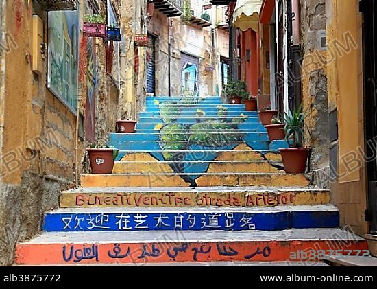 Colorful, painted staircase in a narrow alley, alleyway art, Agrigento, Sicily, Italy, Europe.