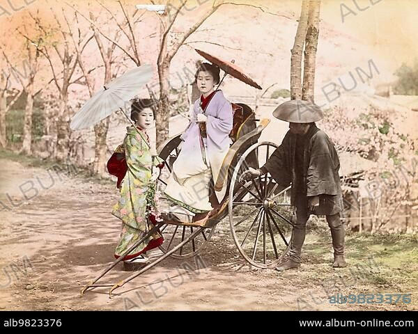 Japanese Women in Traditional Geisha Costume; Dancers Riding the Rishka; c. 1860; Japan; Historic; digitally restored reproduction from a 19th century original; Asia.