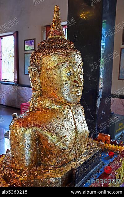 Buddha statue covered with gold leaf, Temple Wat Phra Thong, Phuket, Thailand, Asia.