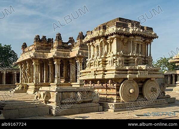 Bajana Mandap and stone chariot at the Vitthala Temple built in the 15th century A. D. during the reign of King Krishna Deva Raya in Hampi, Karnataka, South India, India, Asia. UNESCO World Heritage Site, Asia.