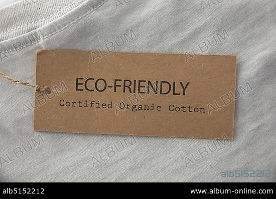 Label on T-shirt stating product is eco-friendly and made from organic cotton.