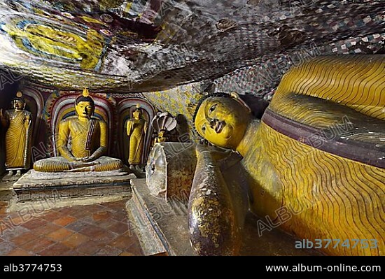 Buddha statues and murals in one of the cave temples of the Golden Temple, UNESCO World Heritage Site, Dambulla, Central Province, Sri Lanka, Asia.