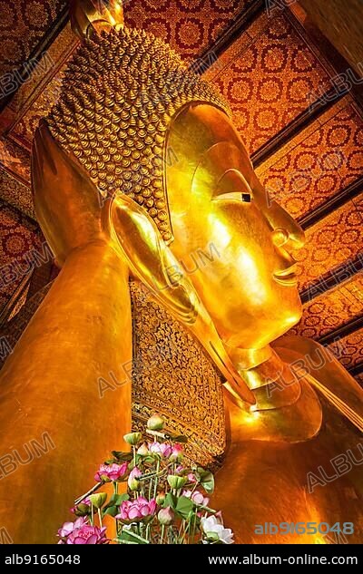 Reclining Buddha face. Wat Pho, Bangkok, Thailand, Asia.