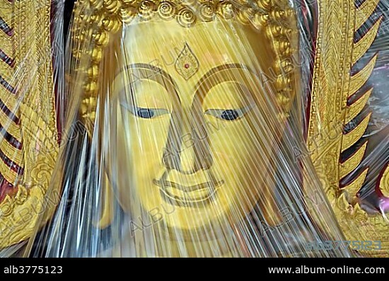 Buddha statue covered with plastic foil, produced in a small factory, Bamrung Muang Road, Bangkok, Thailand, Asia, PublicGround, Asia.