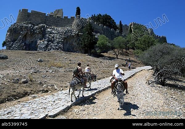 Donkey ride to the Acropolis, Lindos, Rhodes Island, Dodecanese Islands Chain, Greece, Europe.