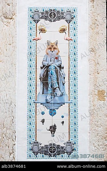 Tile image on a wall, fox sitting on a chair, Lisbon, Portugal, Europe.